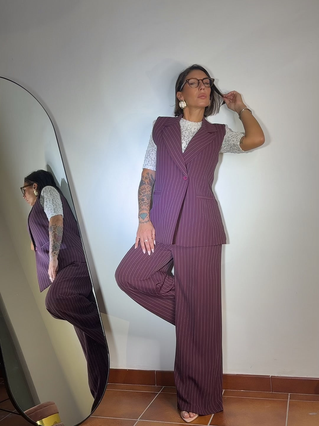 Tailleur smanicato gessato